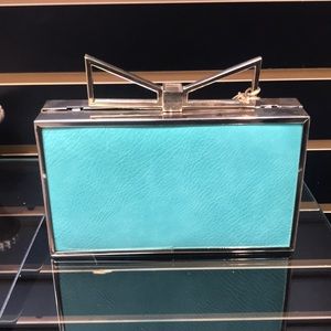 Teal bow clutch